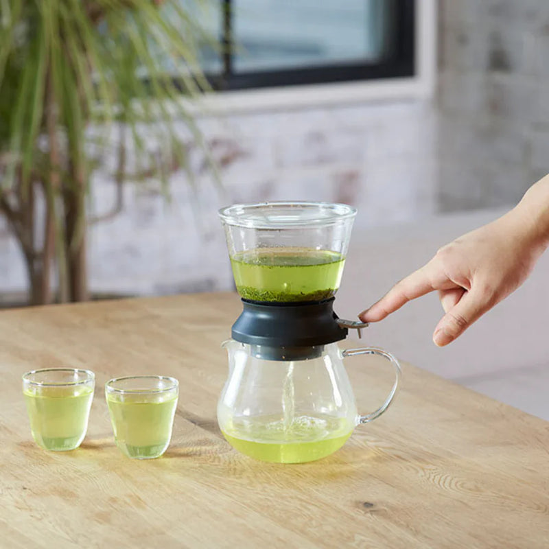 Load image into Gallery viewer, Hario Tea Dripper LARGO 35 set featuring a round glass steeping bowl, silicone base, and matching 800ml glass server.