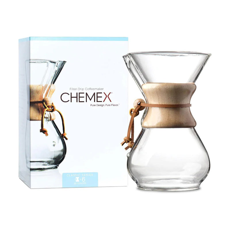 Load image into Gallery viewer, Chemex Classic Series 6-cup pour-over coffeemaker with the signature wood collar and leather cord. Packing case image
