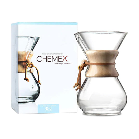Chemex Classic Series 6-cup pour-over coffeemaker with the signature wood collar and leather cord. Packing case image