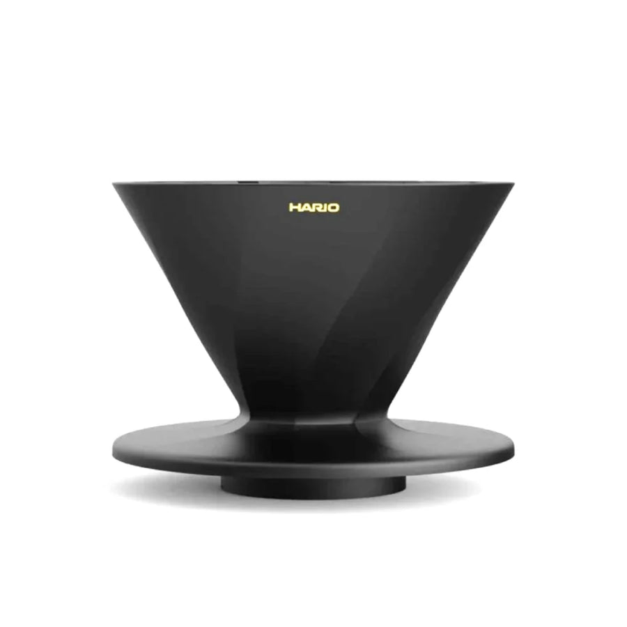 The Hario Alpha coffee dripper in matte black, featuring a minimalist cone-shaped design for manual pour-over brewing.